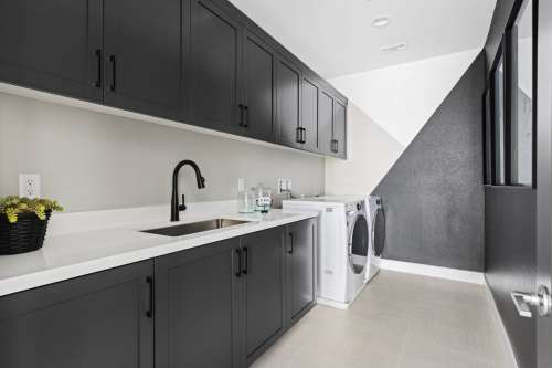 Laundry room in Plan 2 Model Home